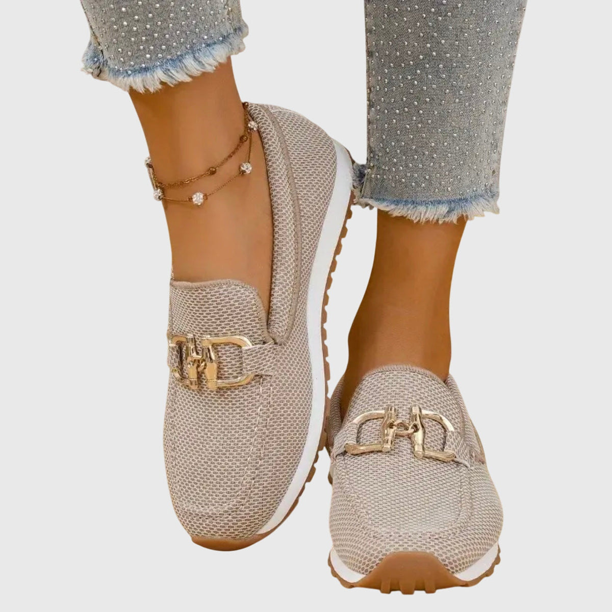 Womens slip-on loafers in neutral tones with a clean, casual silhouette