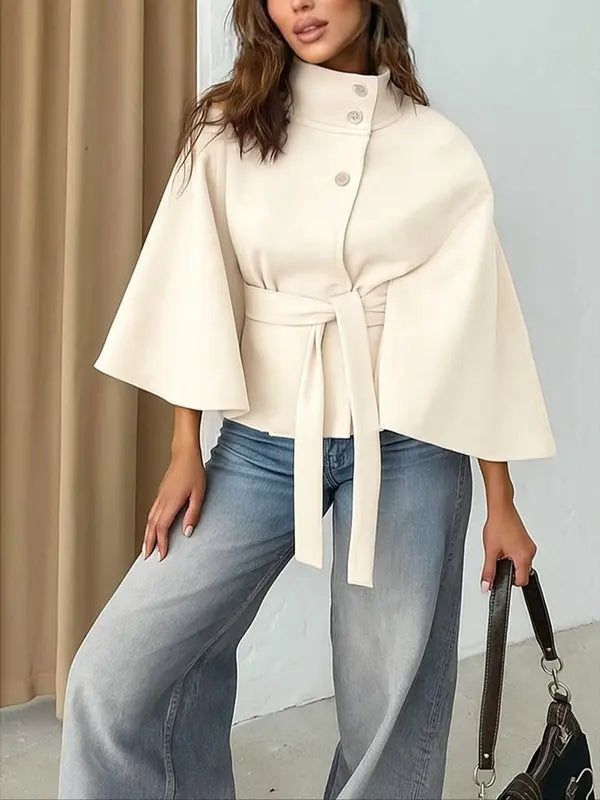 Thelma front buckle belted coat with tailored waist, shown in a neutral tone