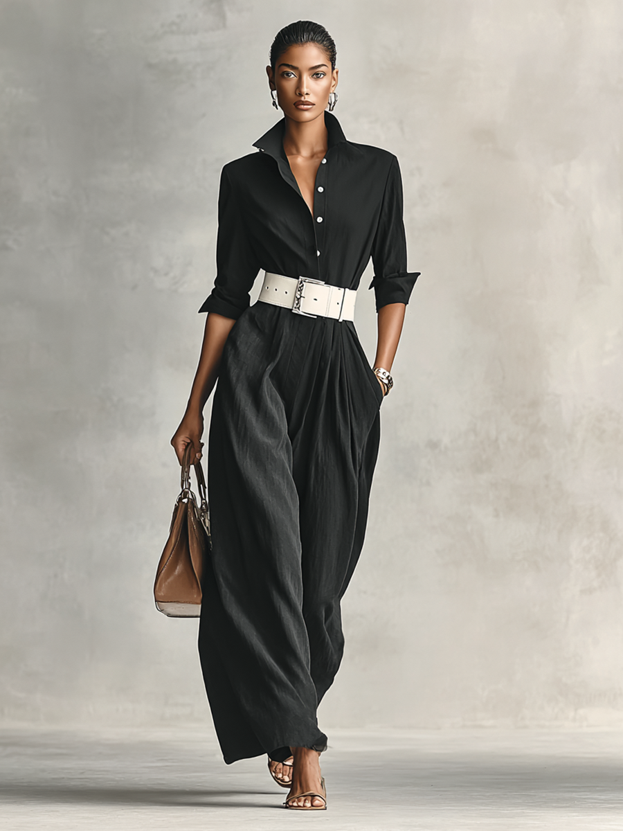 Black longline single-breasted jacket with a classic lapel, worn open