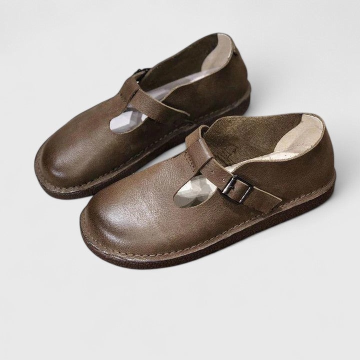 Nessa classic strap flats in brown and black with a cushioned sole