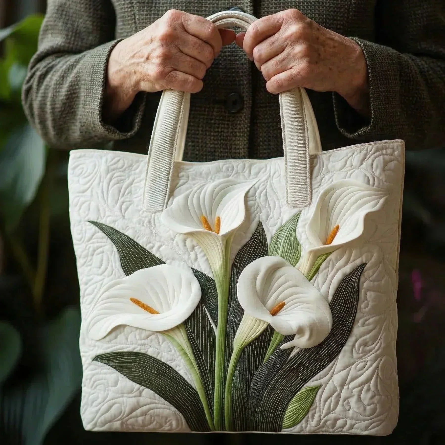 White Lilies quilted artisan handmade bag with textured stitching, shown in two sizes