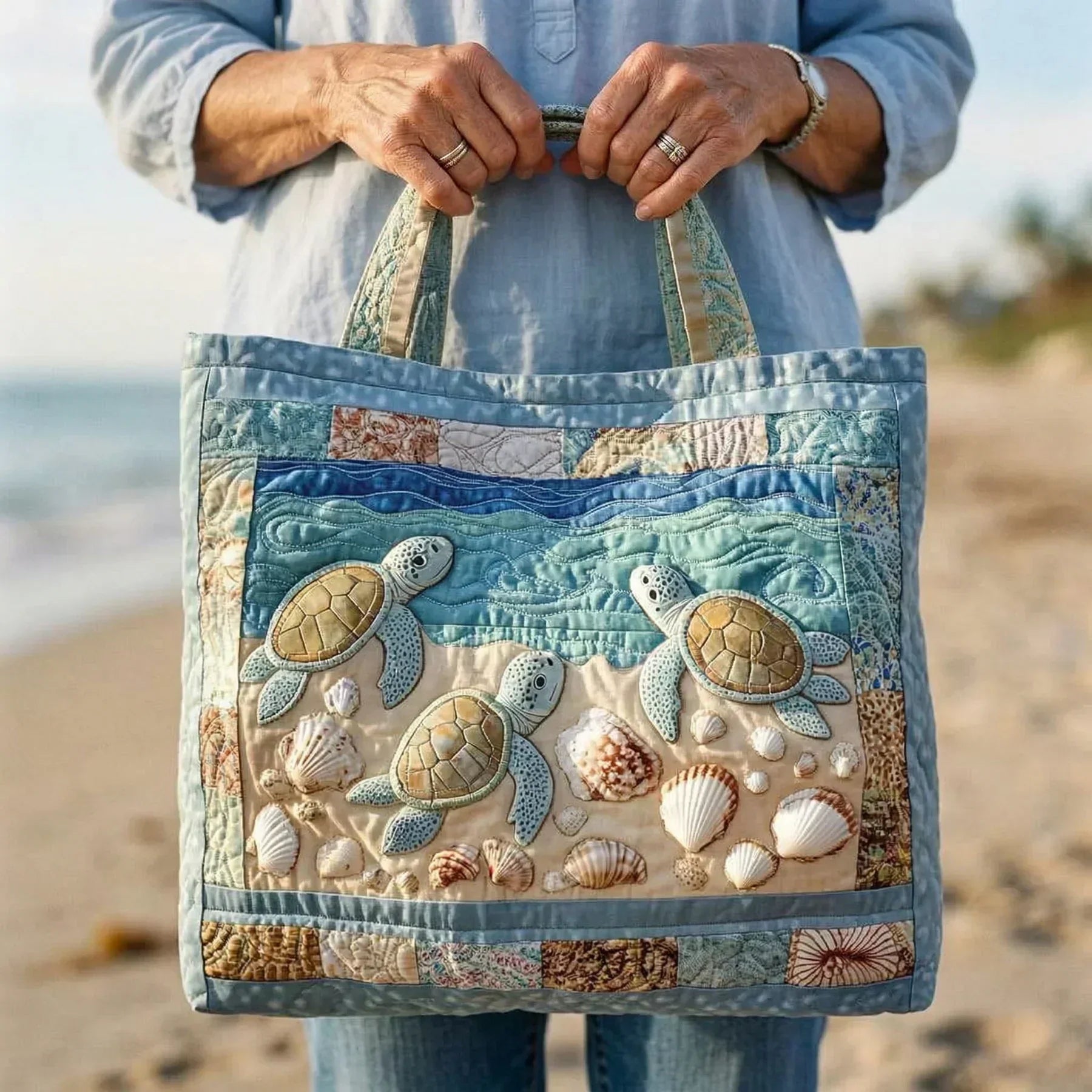 Handmade quilted tote bag featuring a coastal sea turtles design