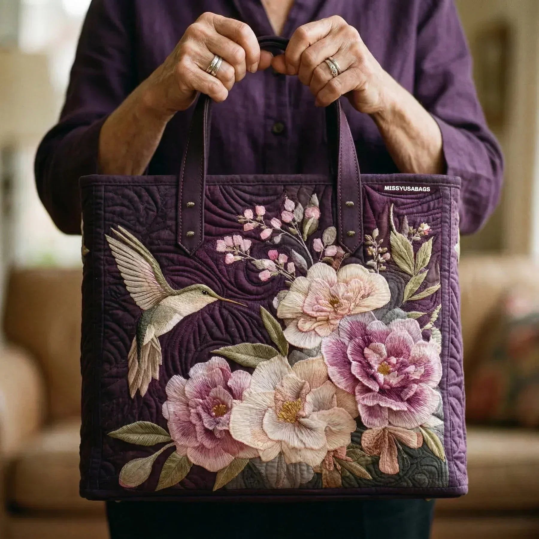 Quilted tote bag with a hummingbirds and orchids print