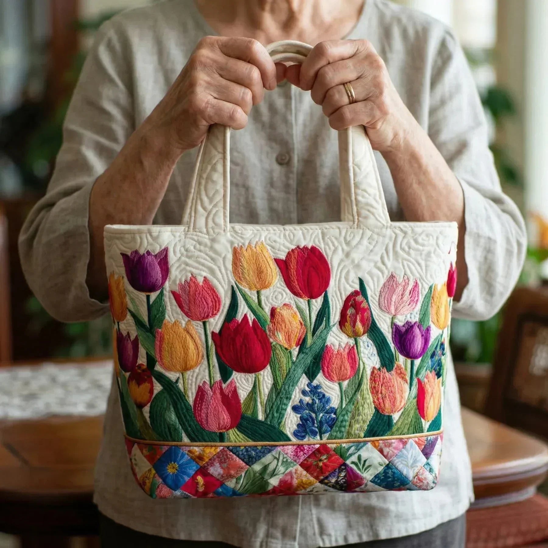 Quilted tote bag in a floral tulip garden print with structured stitched texture