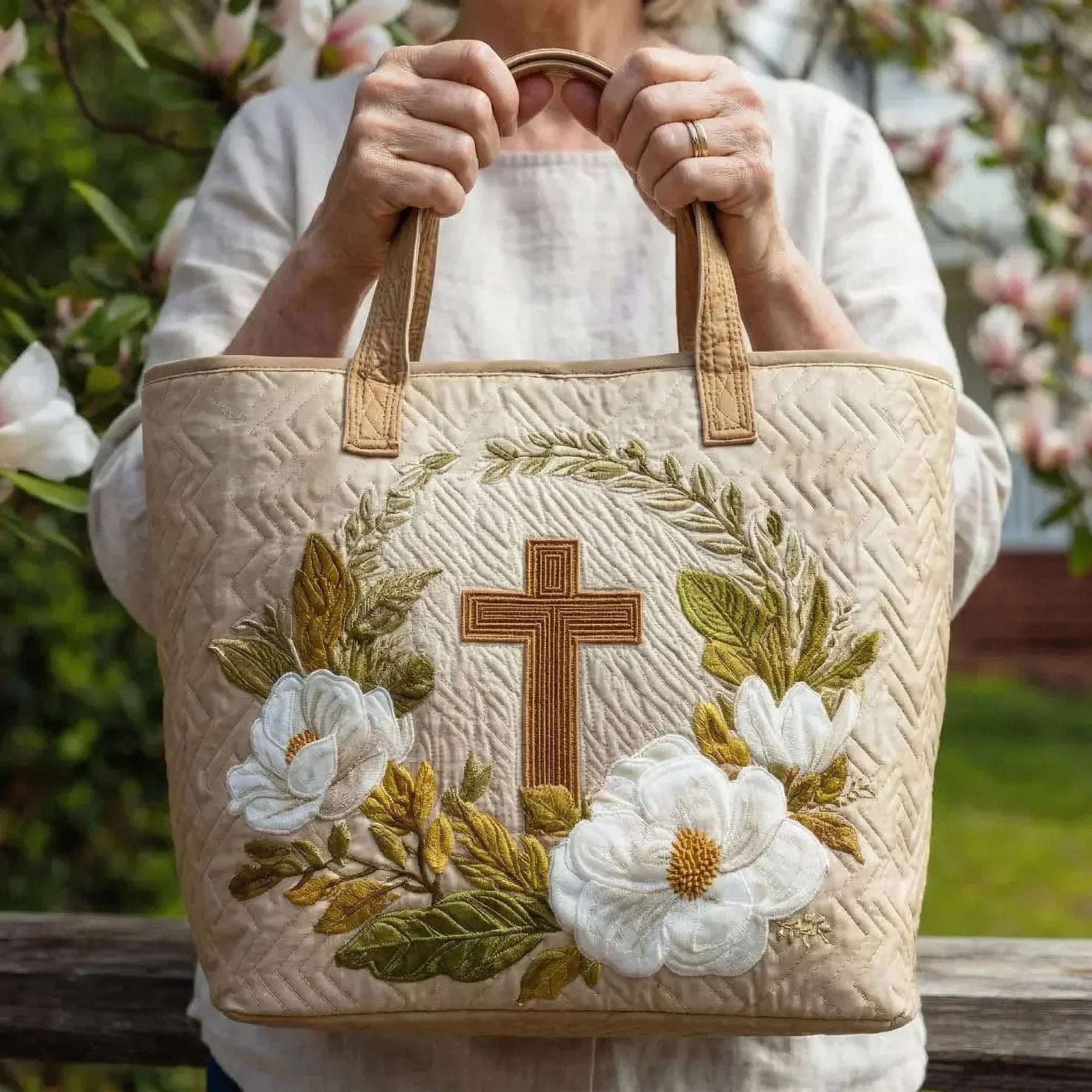 Handmade artisan tote bag with sacred cross design, shown in two sizes