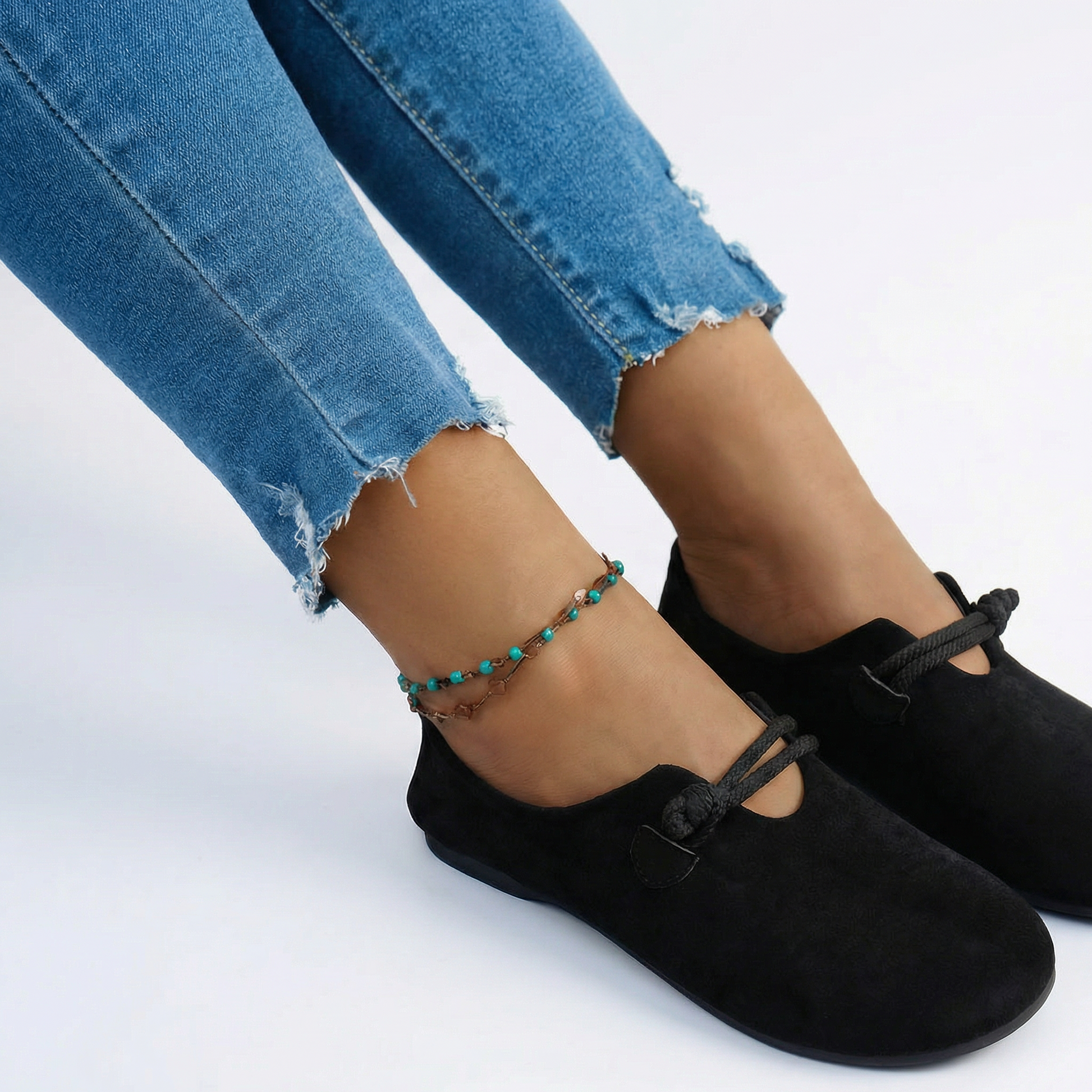 Anisa elegant moccasins in beige and black, classic loafer silhouette for everyday wear