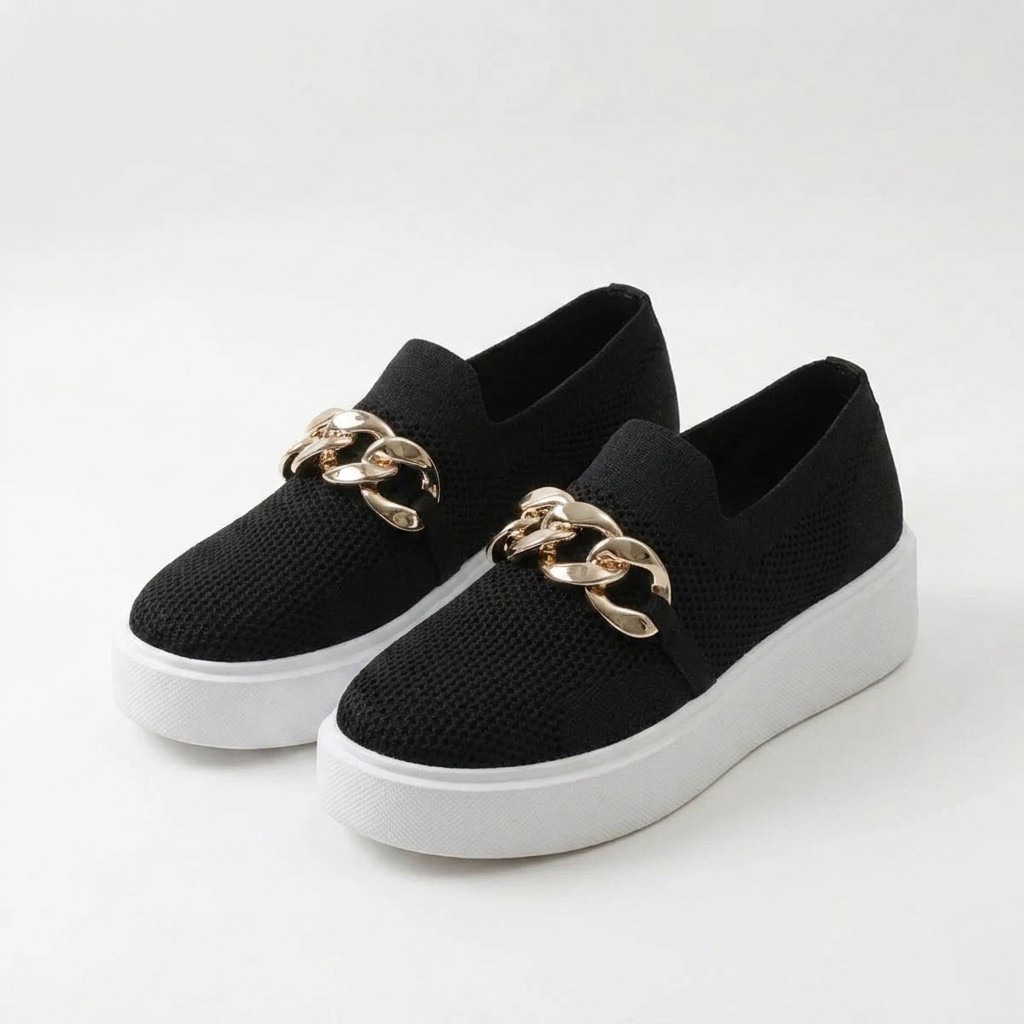 Womens chain-detail slip-on loafers shown in black, camel, white and red