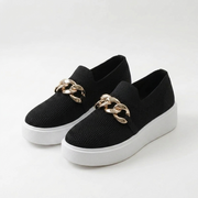 Womens chain-detail slip-on loafers shown in black, camel, white and red