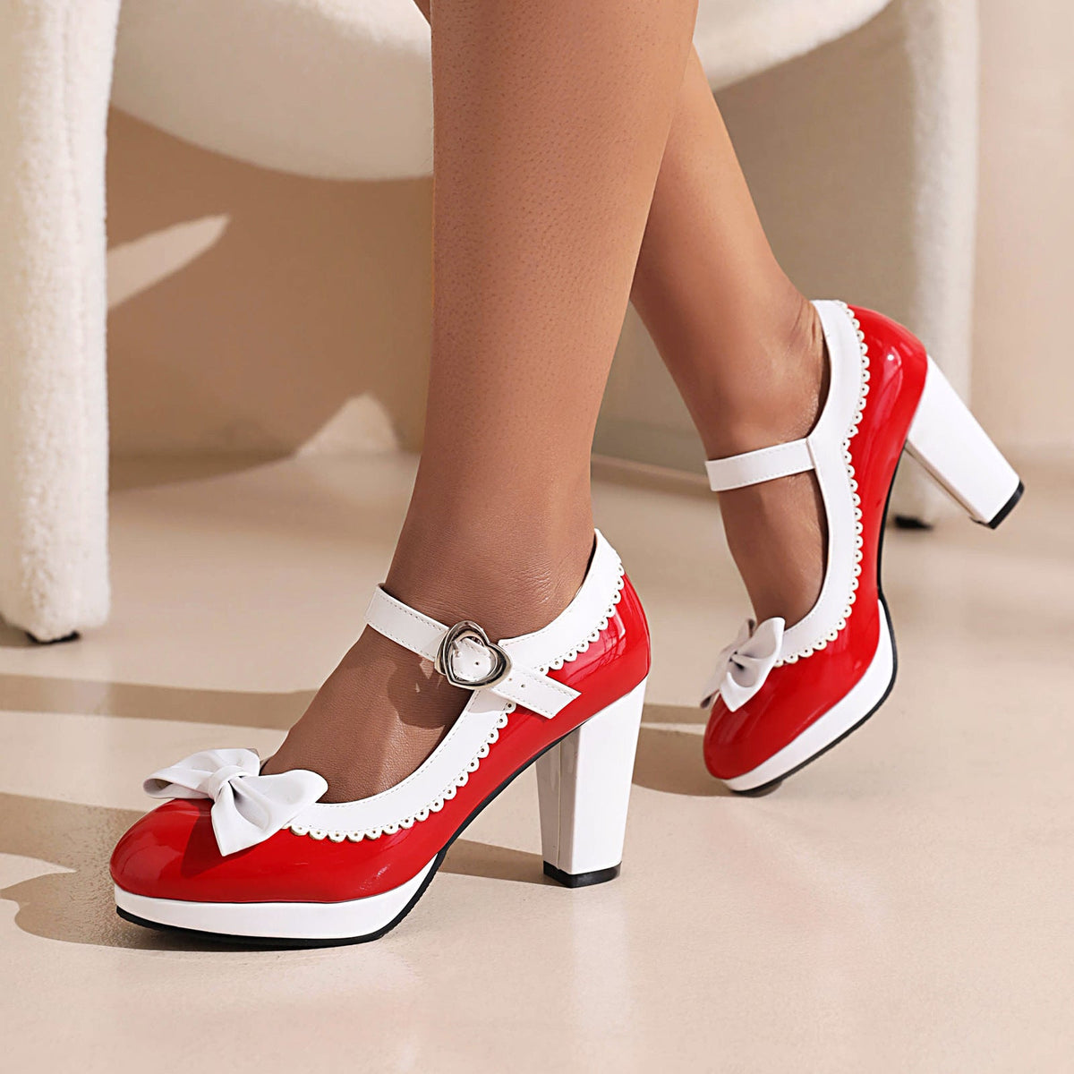 Retro Mary Jane block heels with bow accent, rounded toe and secure strap closure