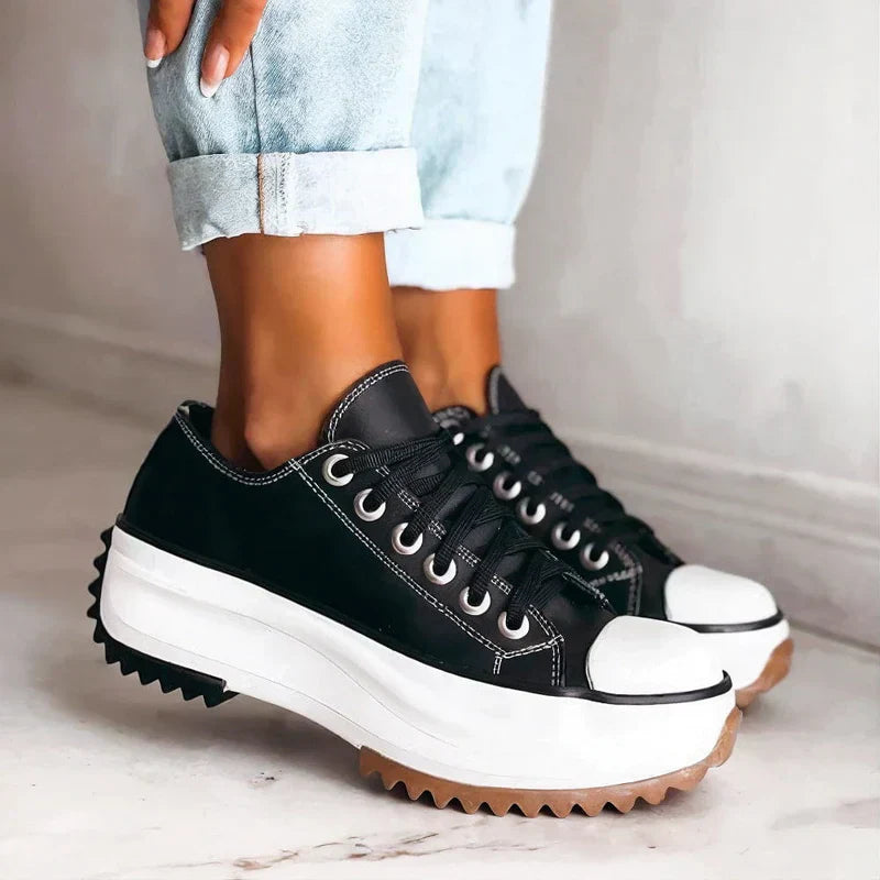 Elisa platform sneakers shown in brown, black and alpine white