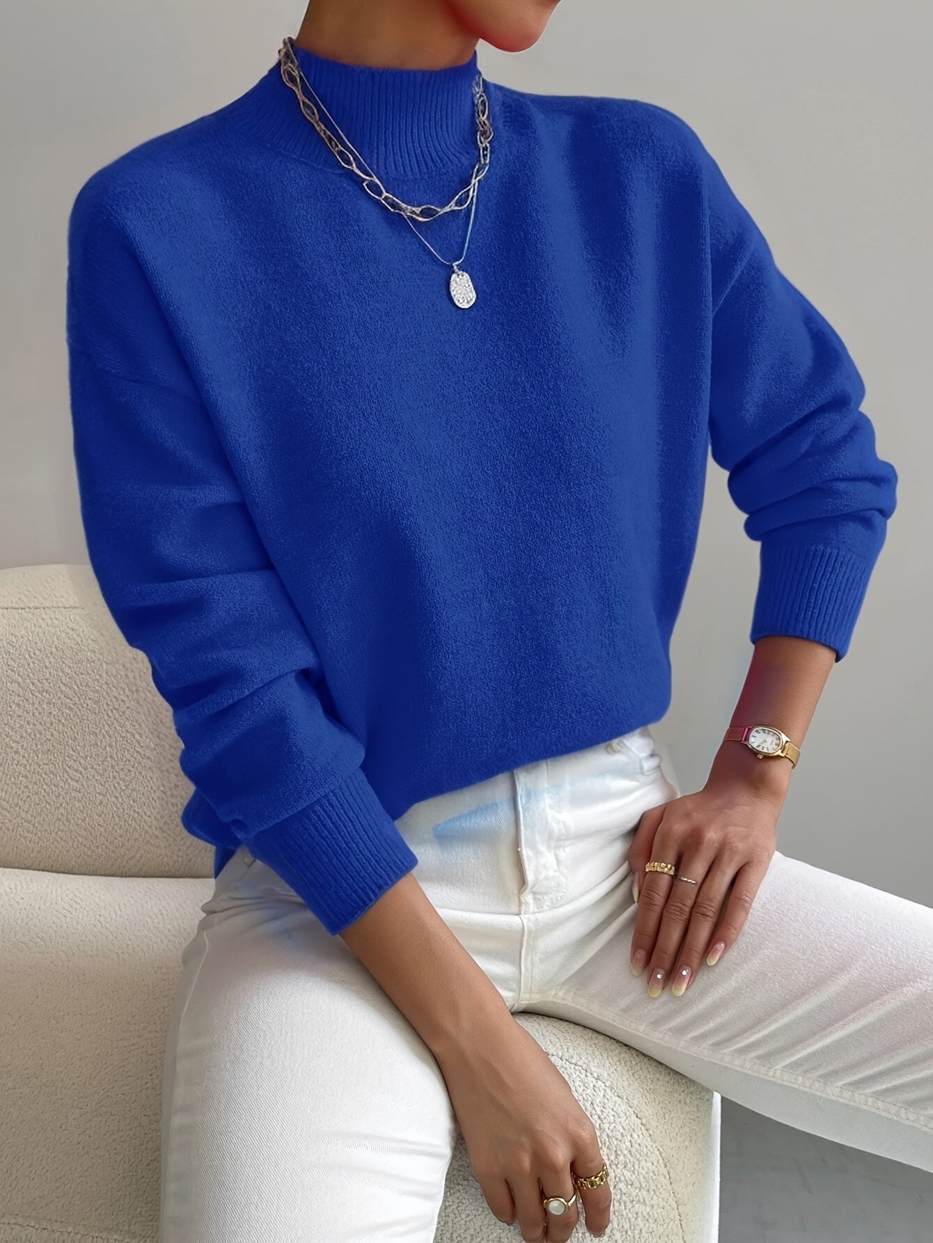 Emily elegant turtleneck knit sweater shown in soft neutral tones