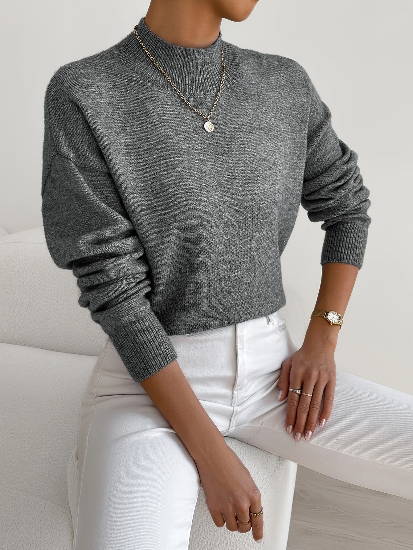 Emily elegant turtleneck knit sweater shown in soft neutral tones