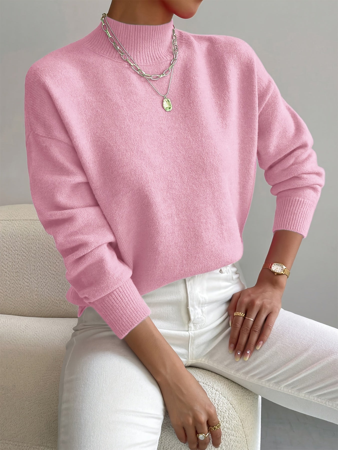 Emily elegant turtleneck knit sweater shown in soft neutral tones