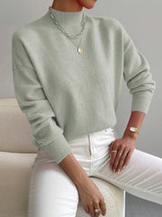 Emily elegant turtleneck knit sweater shown in soft neutral tones