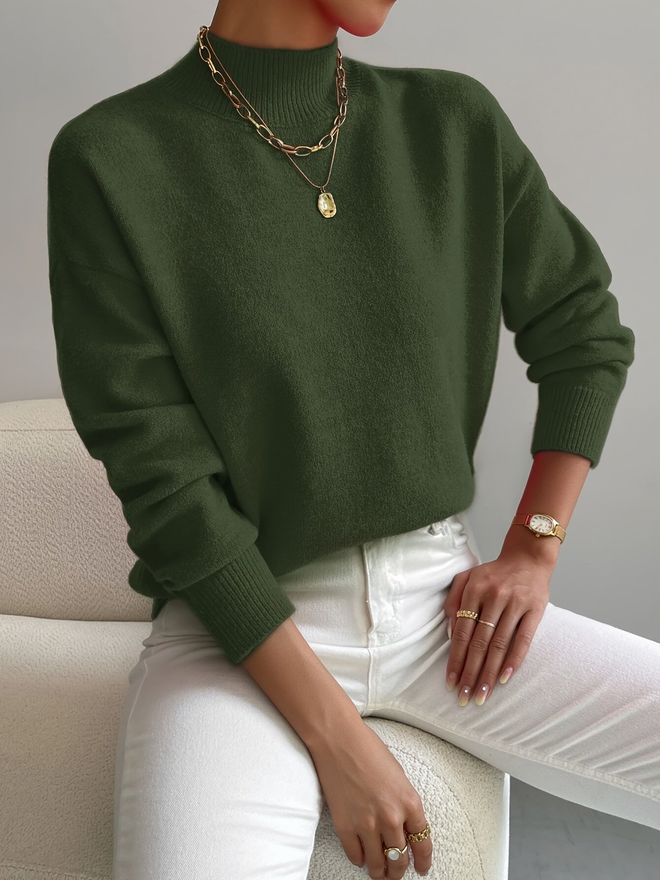 Emily elegant turtleneck knit sweater shown in soft neutral tones