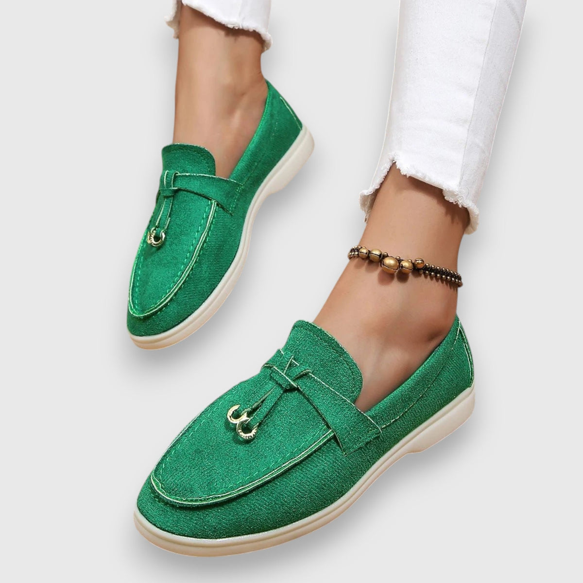Womens slip-on loafers shown in soft neutral and pastel colour options