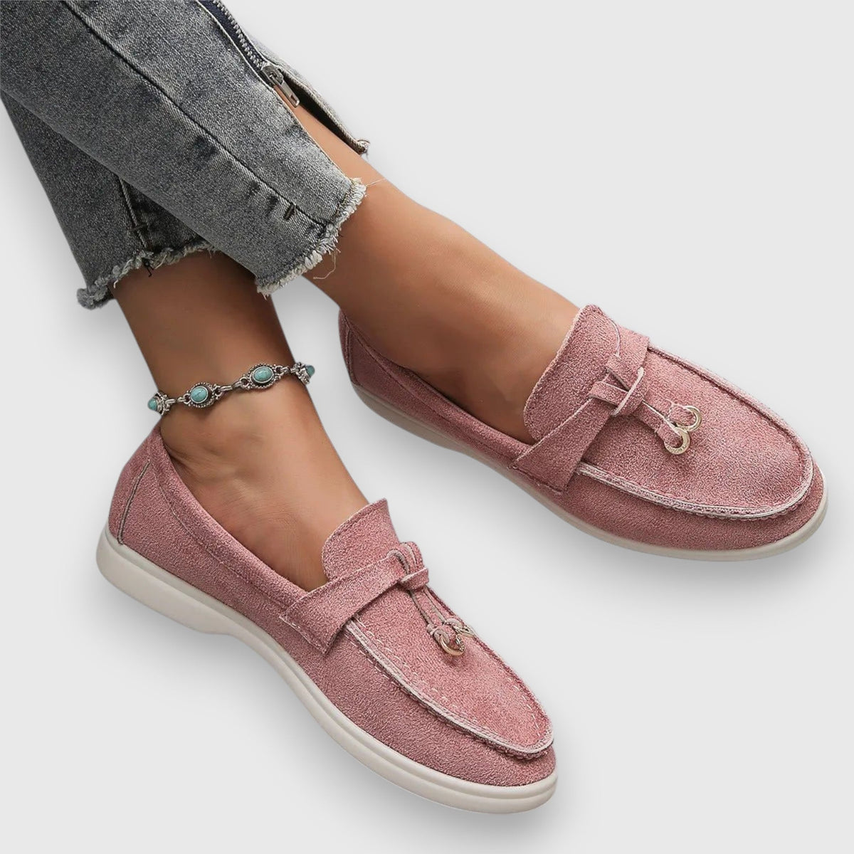 Womens slip-on loafers shown in soft neutral and pastel colour options