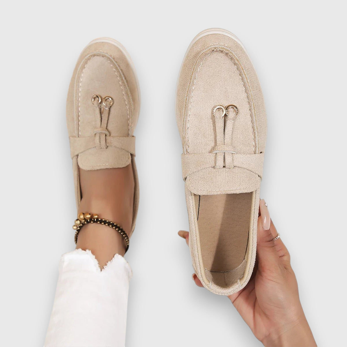 Womens slip-on loafers shown in soft neutral and pastel colour options