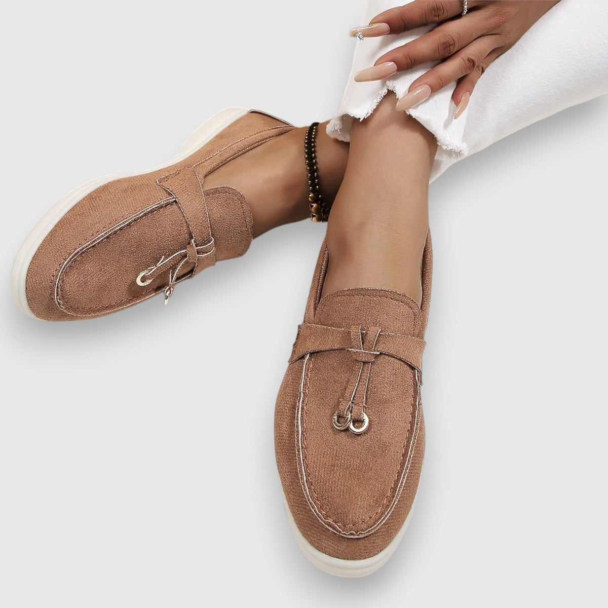 Womens slip-on loafers shown in soft neutral and pastel colour options