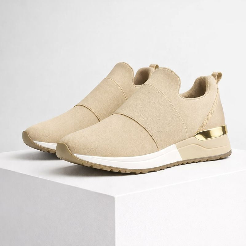 Foam platform slip-on sneakers with gold accent detail and elastic band