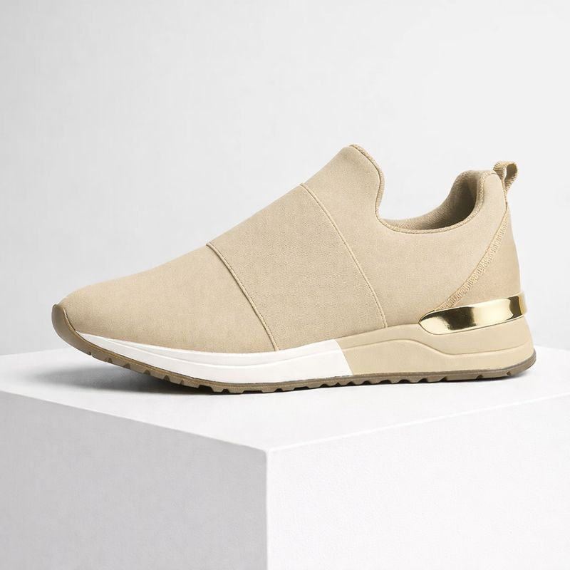 Foam platform slip-on sneakers with gold accent detail and elastic band