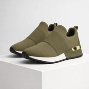 Foam platform slip-on sneakers with gold accent detail and elastic band