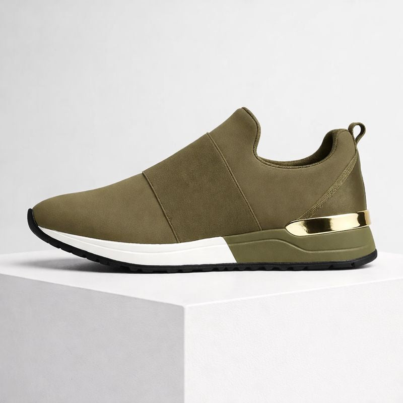 Foam platform slip-on sneakers with gold accent detail and elastic band