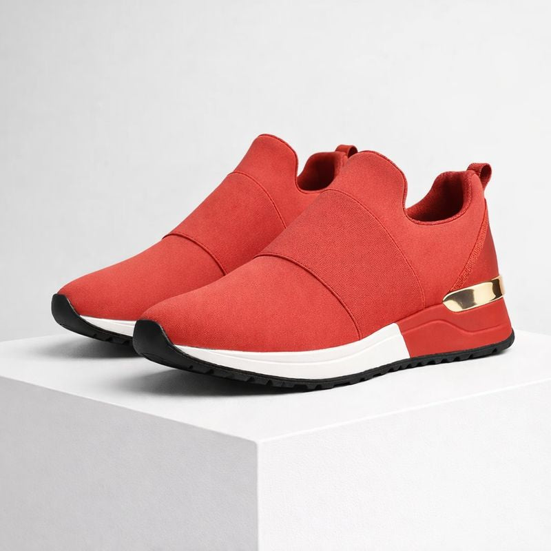 Foam platform slip-on sneakers with gold accent detail and elastic band