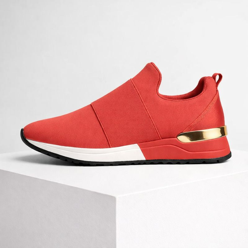 Foam platform slip-on sneakers with gold accent detail and elastic band