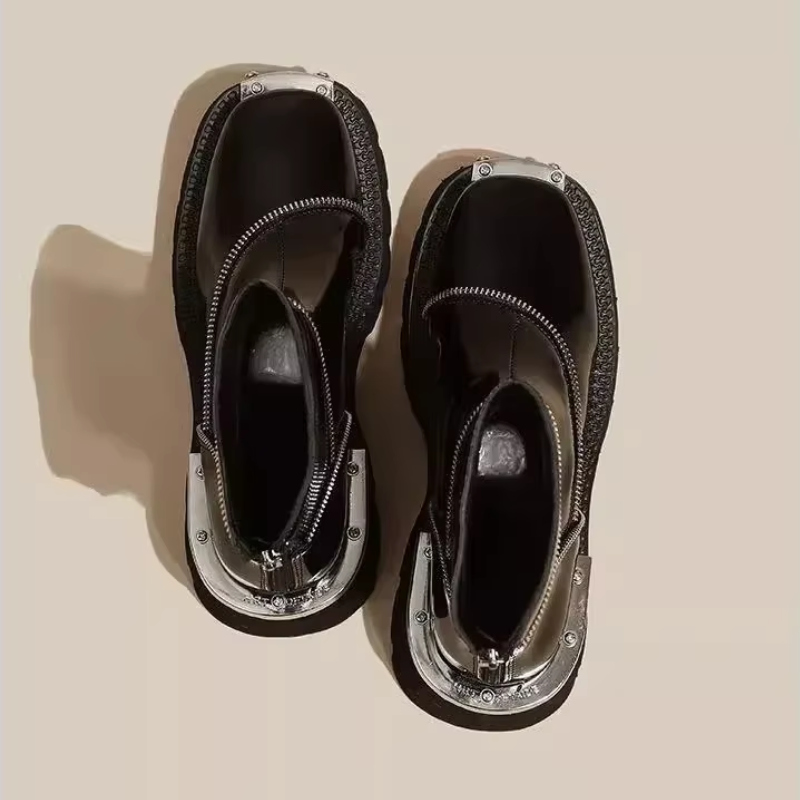 Mid-heel zip boots with rear zipper and water-resistant finish