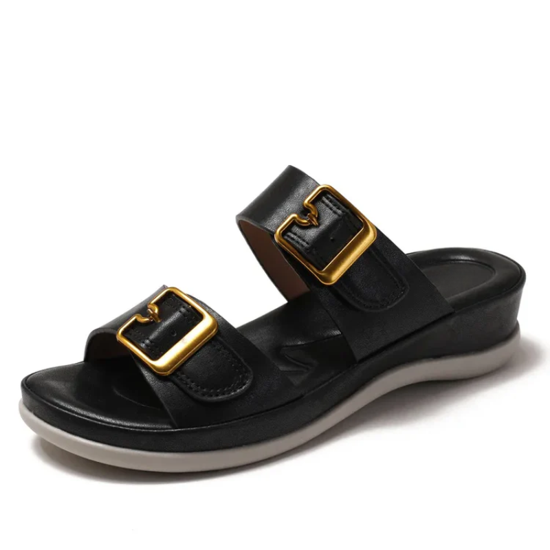 Women's cushioned double-strap slide slippers with gold-tone buckles in a neutral tone