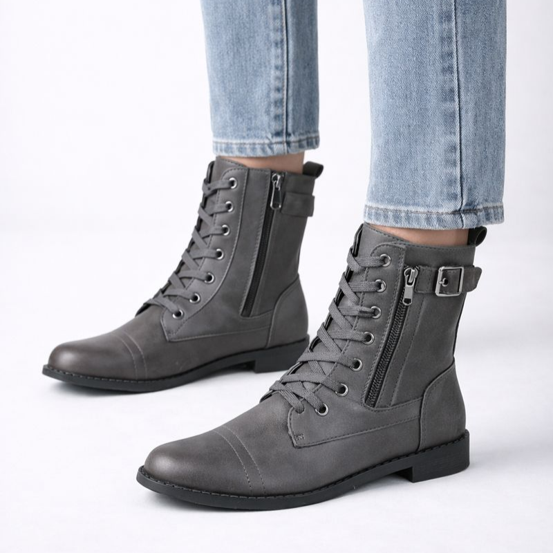 Eco-leather lace-up boots with buckle detail, side zip and a low heel